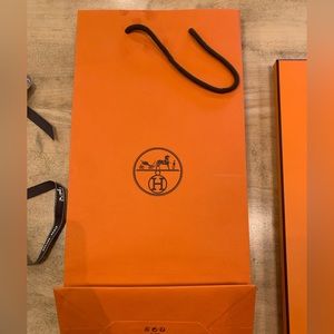 Orange Hermes shopping bag. Small size.